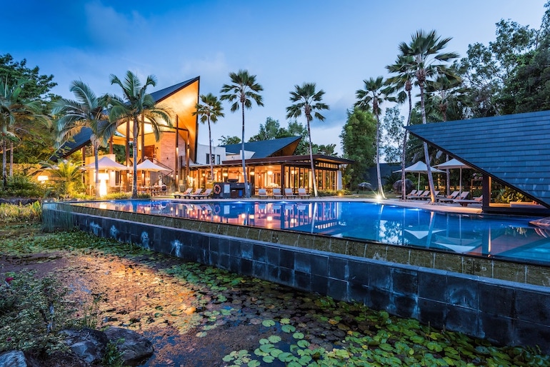 Outdoor pool and lotus pond at Niramaya Villas and Spa