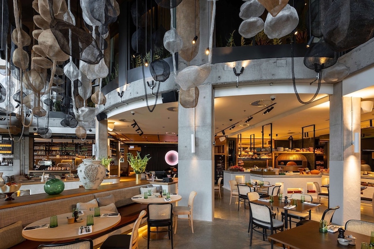 QT Auckland combines modern interior design and industrial chic with tasteful lighting.