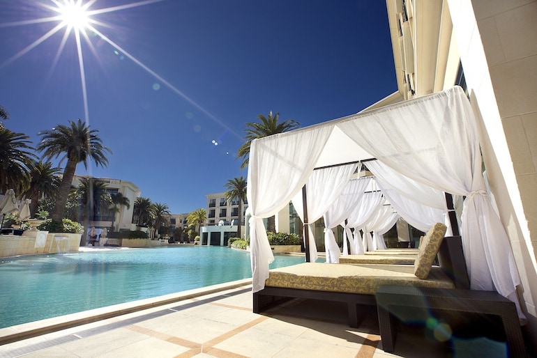 The shaded poolside cabanas at Imperial Hotel Gold Coast