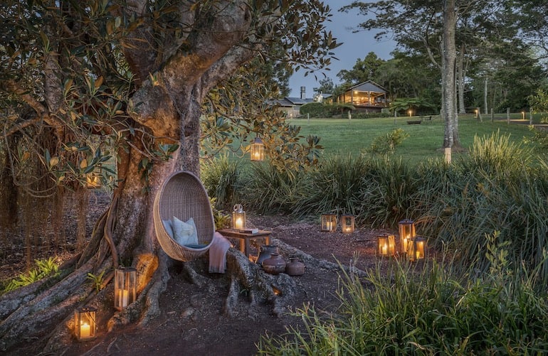 Lanterns and outdoor seating area in the gardens of Spicers Tamarind Retreat