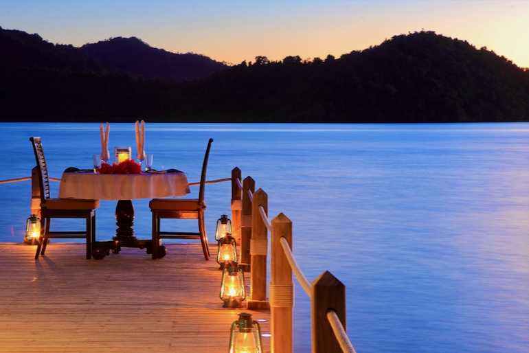 Dinner setup by the sea at Matangi Private Island Resort 