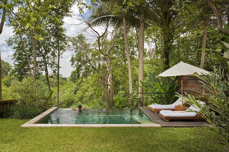Outdoor plunge pool at Como Uma Ubud, with lush mountain views