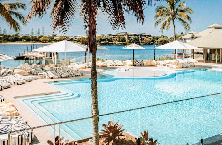 The outdoor pool with bean bags and loungers at Novotel Sunshine Coast Resort Hotel