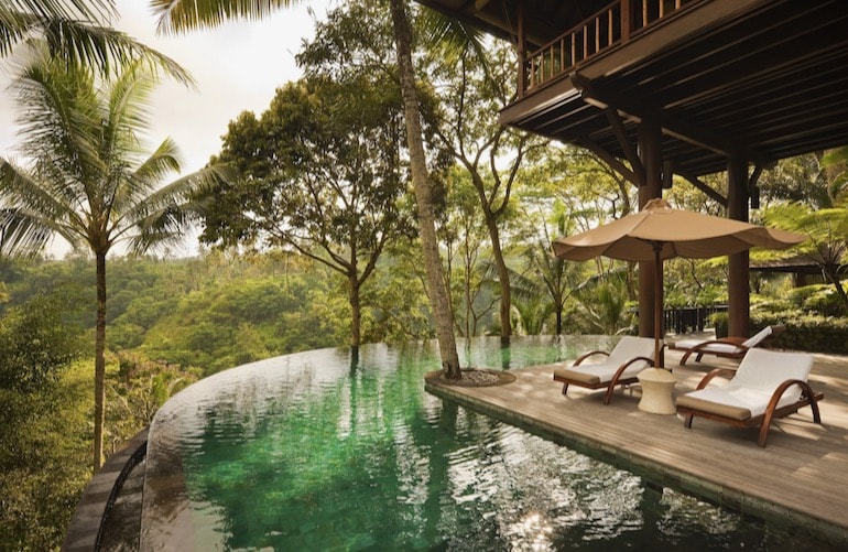 Infinity pools are popular features in adults-only accommodation in Bali and lets guests enjoy amazing views of the surrounding nature.