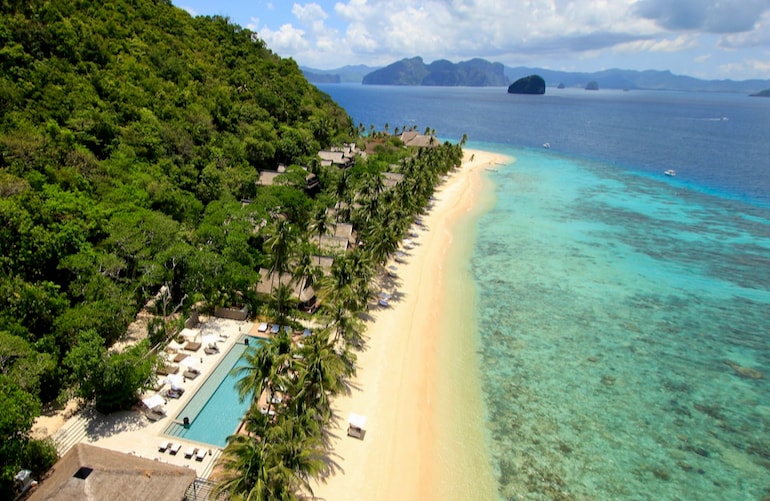 Pangulasian Island Resort's golden shoreline is one of the best beaches in the Philippines